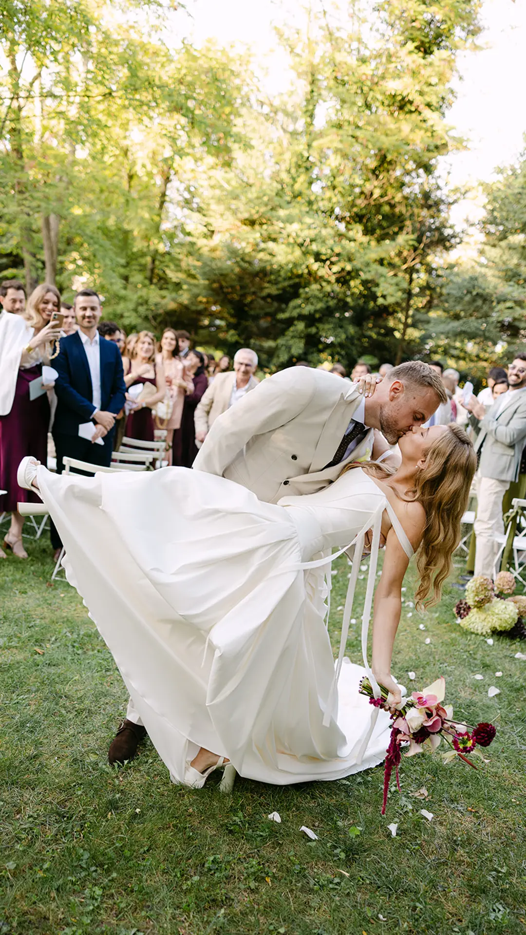 Weddings 1 Couple sharing a romantic wedding kiss.